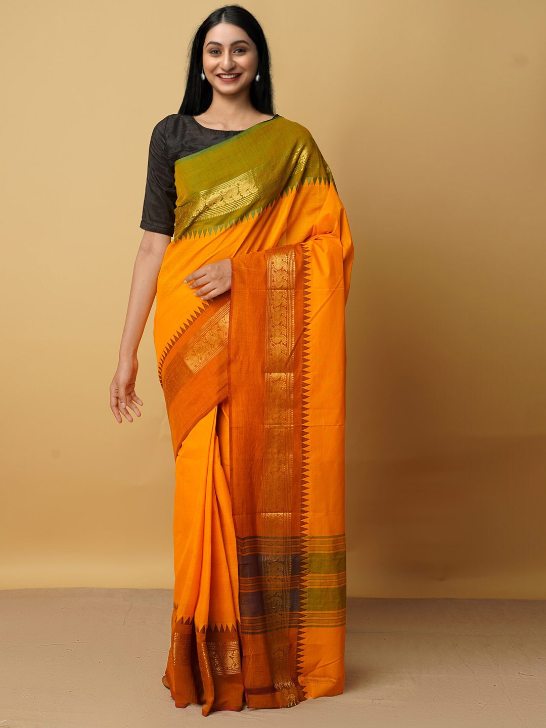

Unnati Silks Orange & Green Zari Pure Cotton Kanjeevaram Saree
