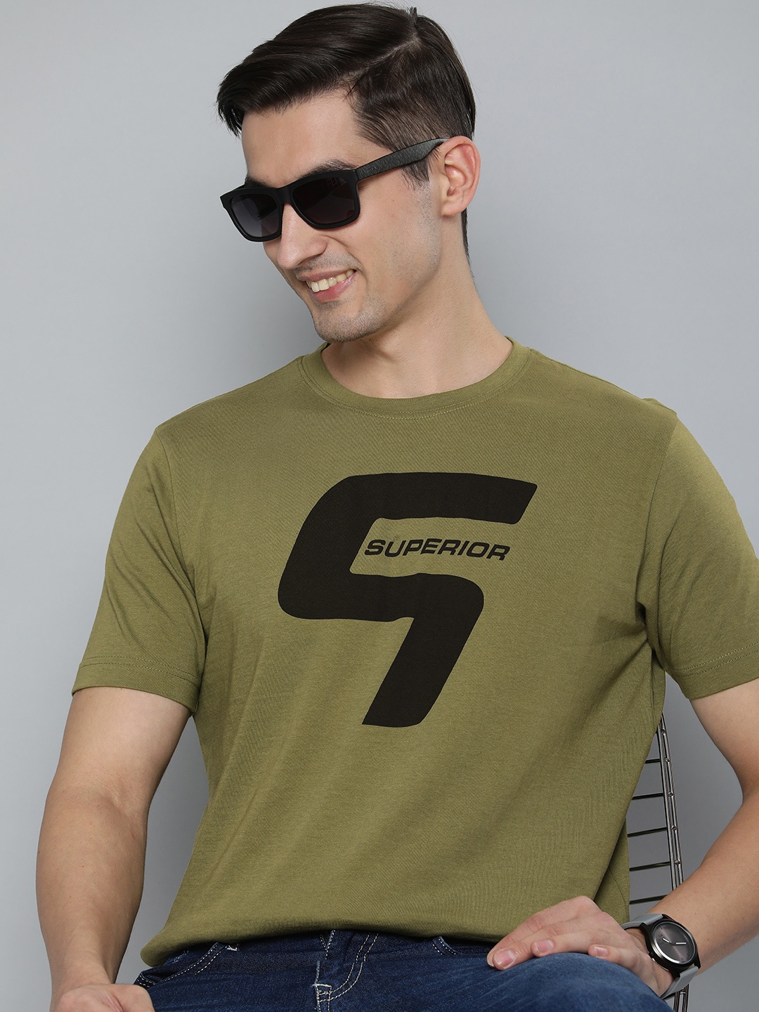 

HERE&NOW Men Olive Green & Black Typography Printed Pure Cotton T-shirt