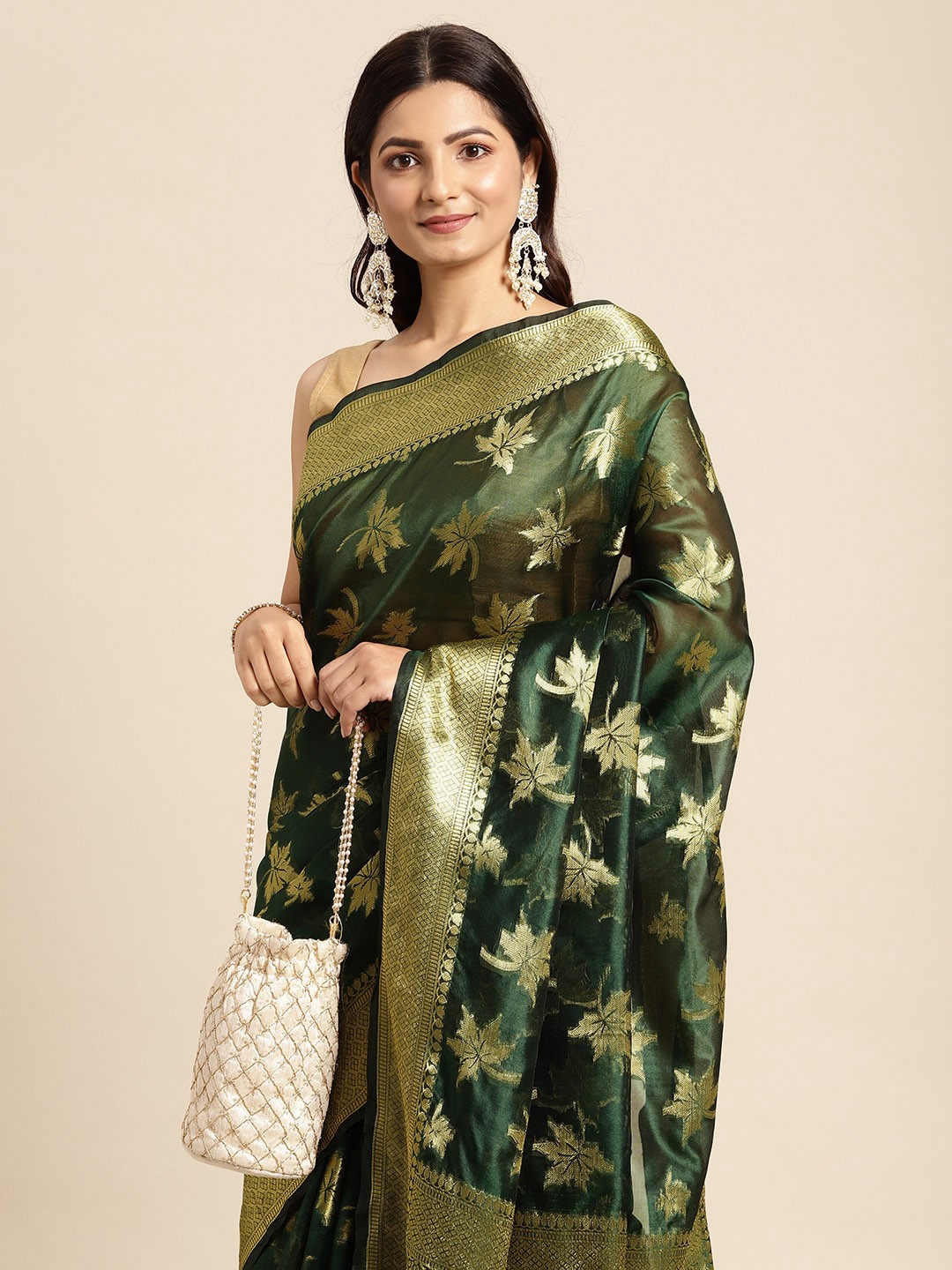 

Mitera Green & Golden Ethnic Motifs Zari Organza Kanjeevaram Saree