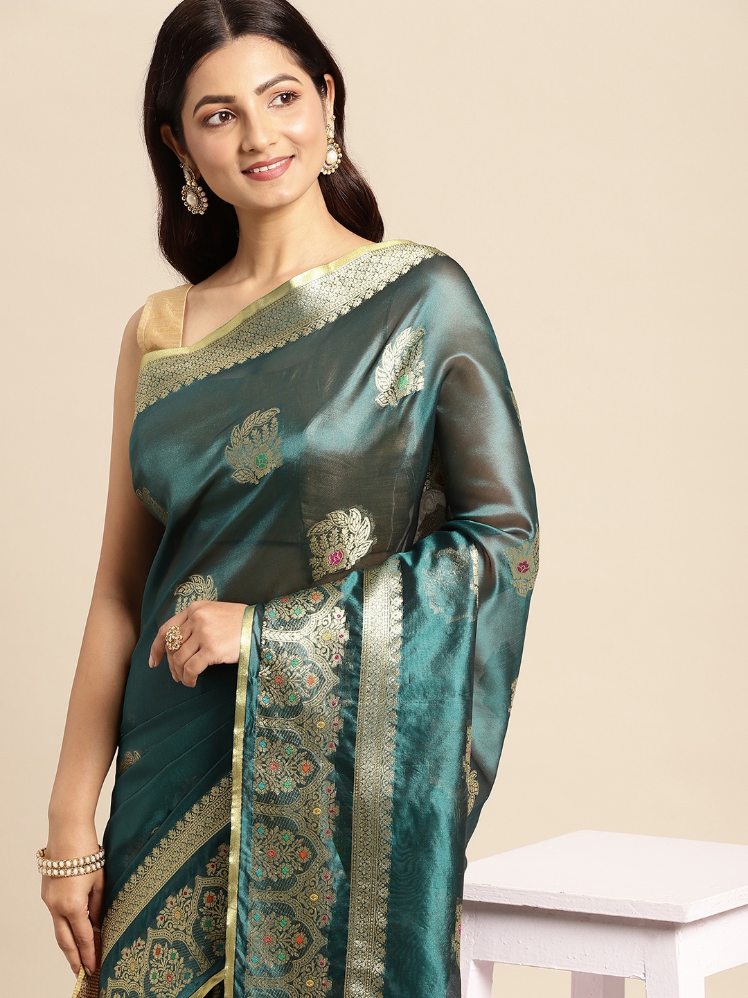 

Mitera Teal & Golden Ethnic Motifs Zari Organza Kanjeevaram Saree