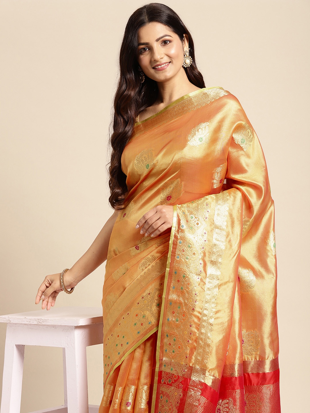 

Mitera Orange & Golden Ethnic Motifs Zari Organza Kanjeevaram Saree
