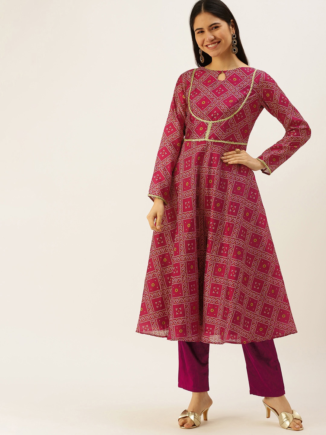 

Ethnovog Women Purple Pink Ethnic Motifs Printed Kurta with Trousers