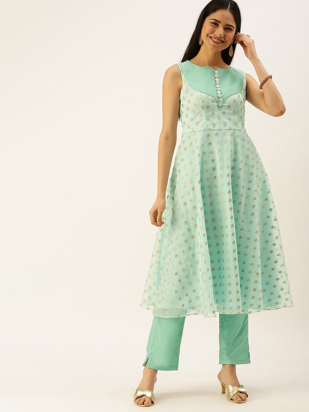 

Ethnovog Women Green Ethnic Motifs Printed Kurta with Trousers