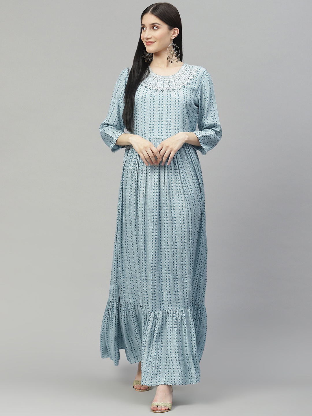 

Divena Blue Printed Mirror Work Detail Muslin Maxi Flared Gown