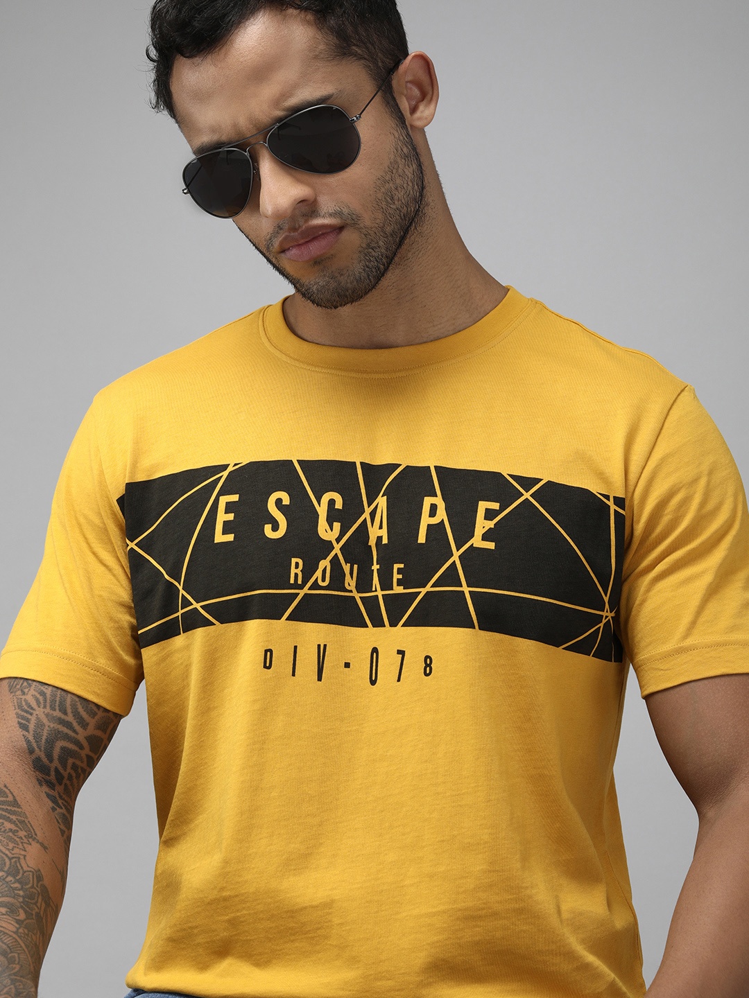 

Roadster Men Mustard Yellow & Black Printed Pure Cotton T-shirt