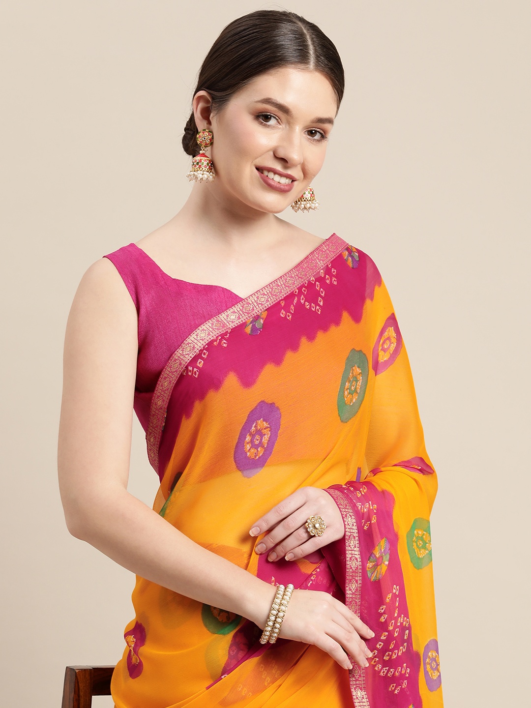 

Saree mall Mustard Yellow & Fuchsia Ethnic Motifs Bandhani Sarees