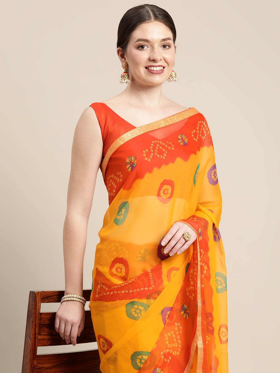 

Saree mall Mustard & Orange Bandhani Sarees
