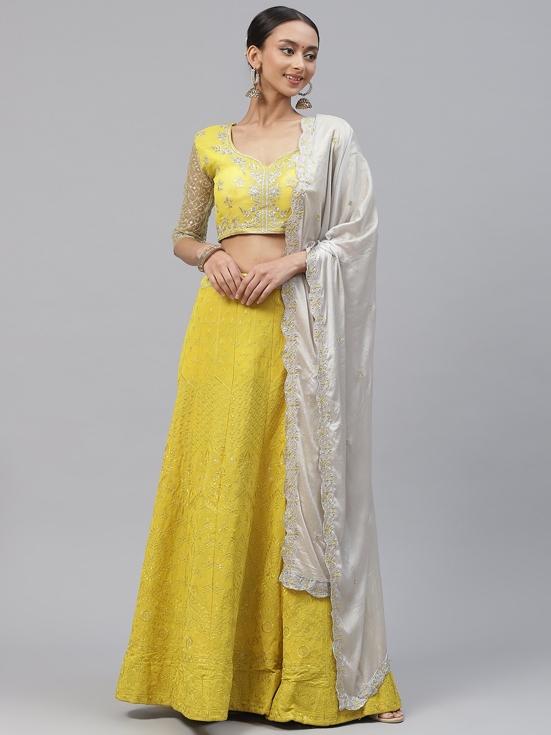 

Divine International Trading Co Yellow & Off White Embroidered Thread Work Semi-Stitched Lehenga &