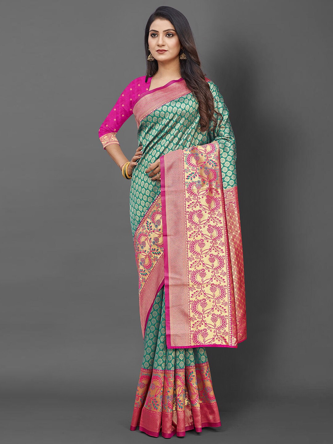 

Mitera Teal & Pink Woven Design Zari Silk Blend Banarasi Saree