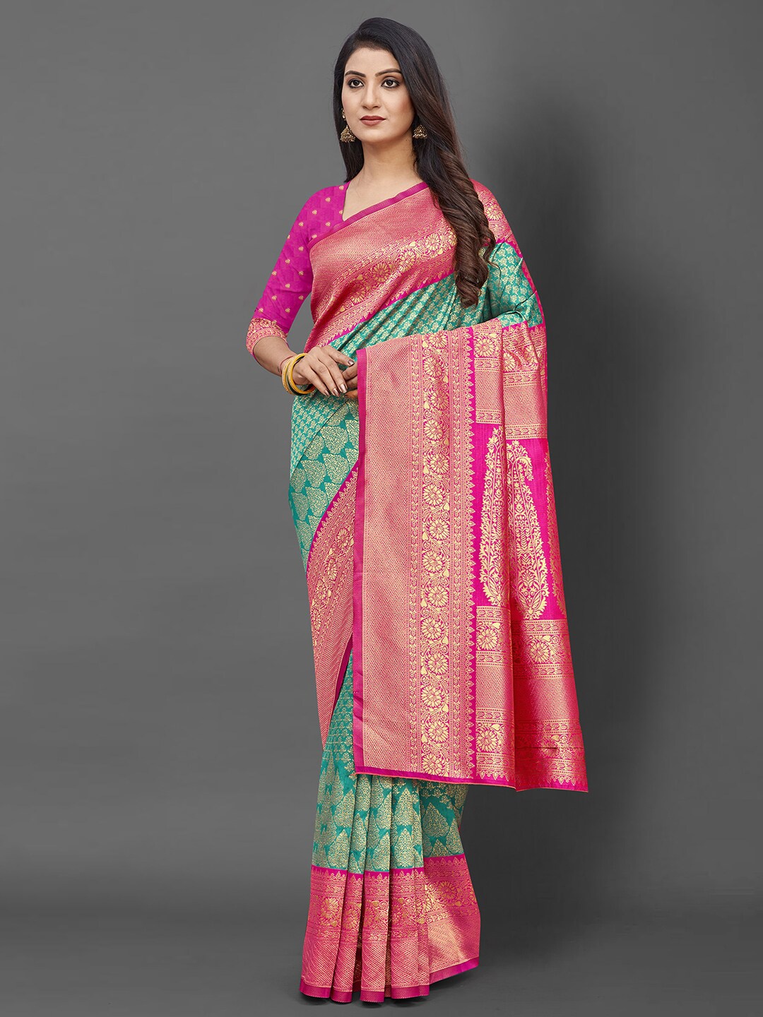 

Mitera Teal & Pink Woven Design Zari Silk Blend Banarasi Saree