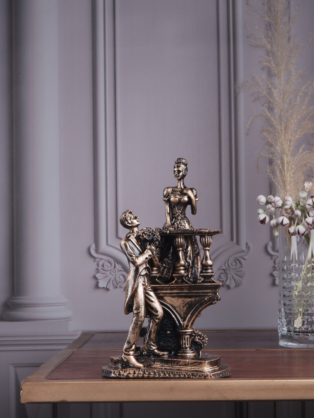 

THE WHITE INK DECOR Metallic-Colored Textured Couple Figurine Showpieces