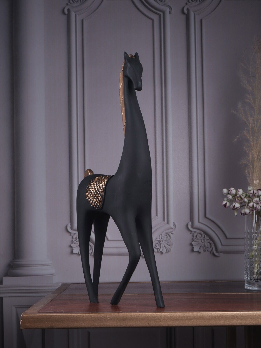 

THE WHITE INK DECOR Black & Gold Solid Giraffe-Shaped Figurine Showpieces