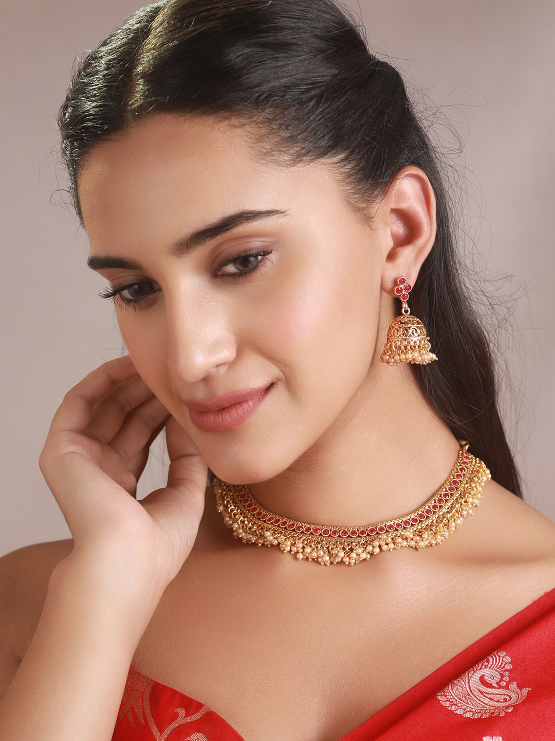 

Priyaasi Gold-Plated Pink Stone-Studded & Pearl Beaded Jewellery Set