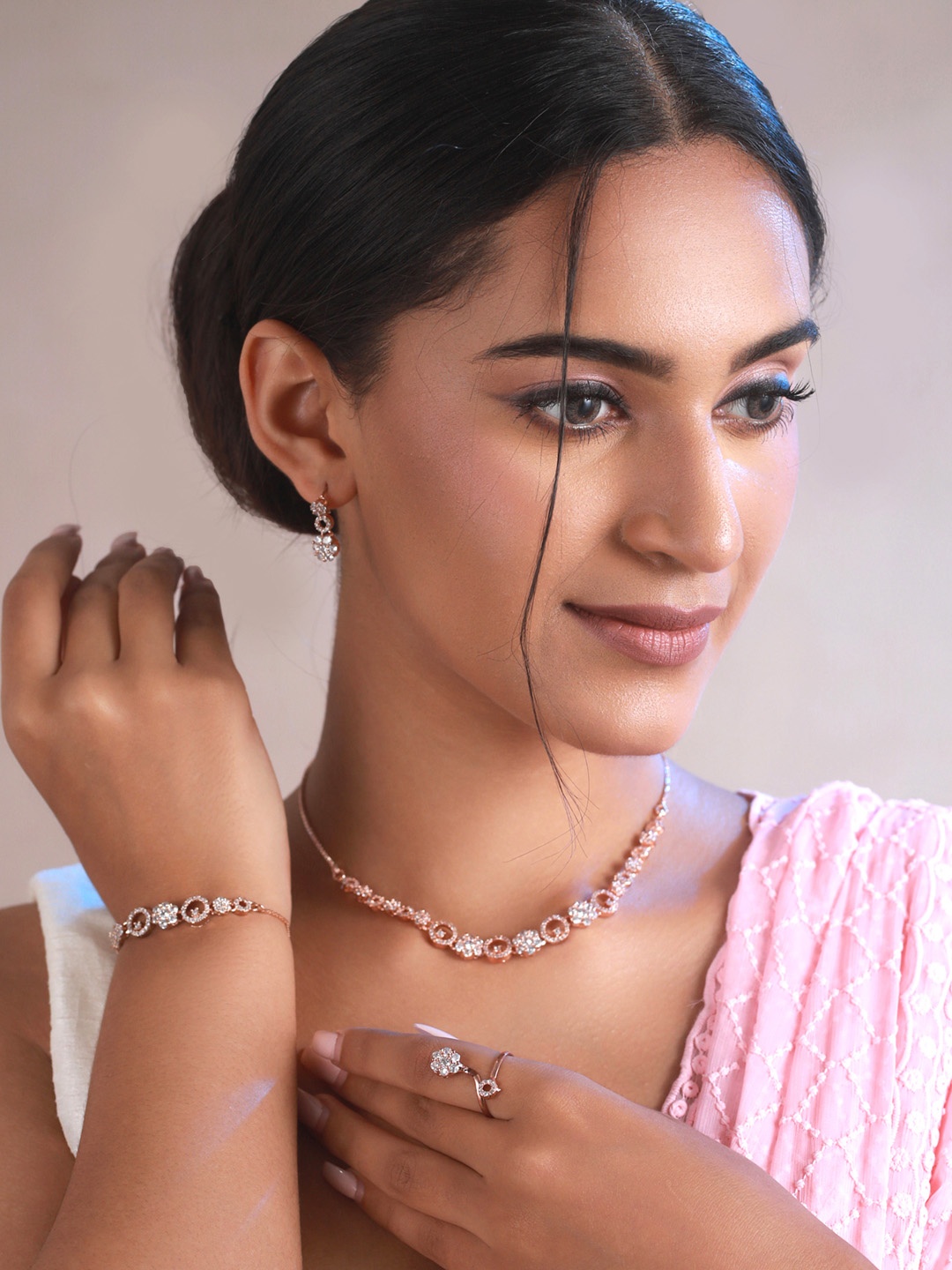 

Priyaasi Rose Gold-Plated & White AD Stone-Studded Jewellery Set