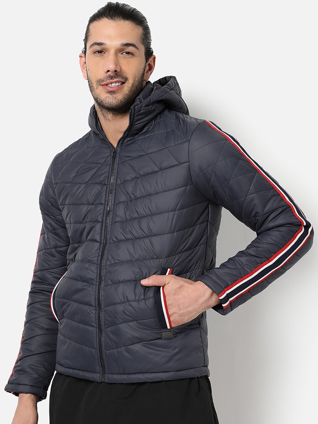 

Campus Sutra Men Blue Windcheater Crop Outdoor Padded Jacket with Patchwork