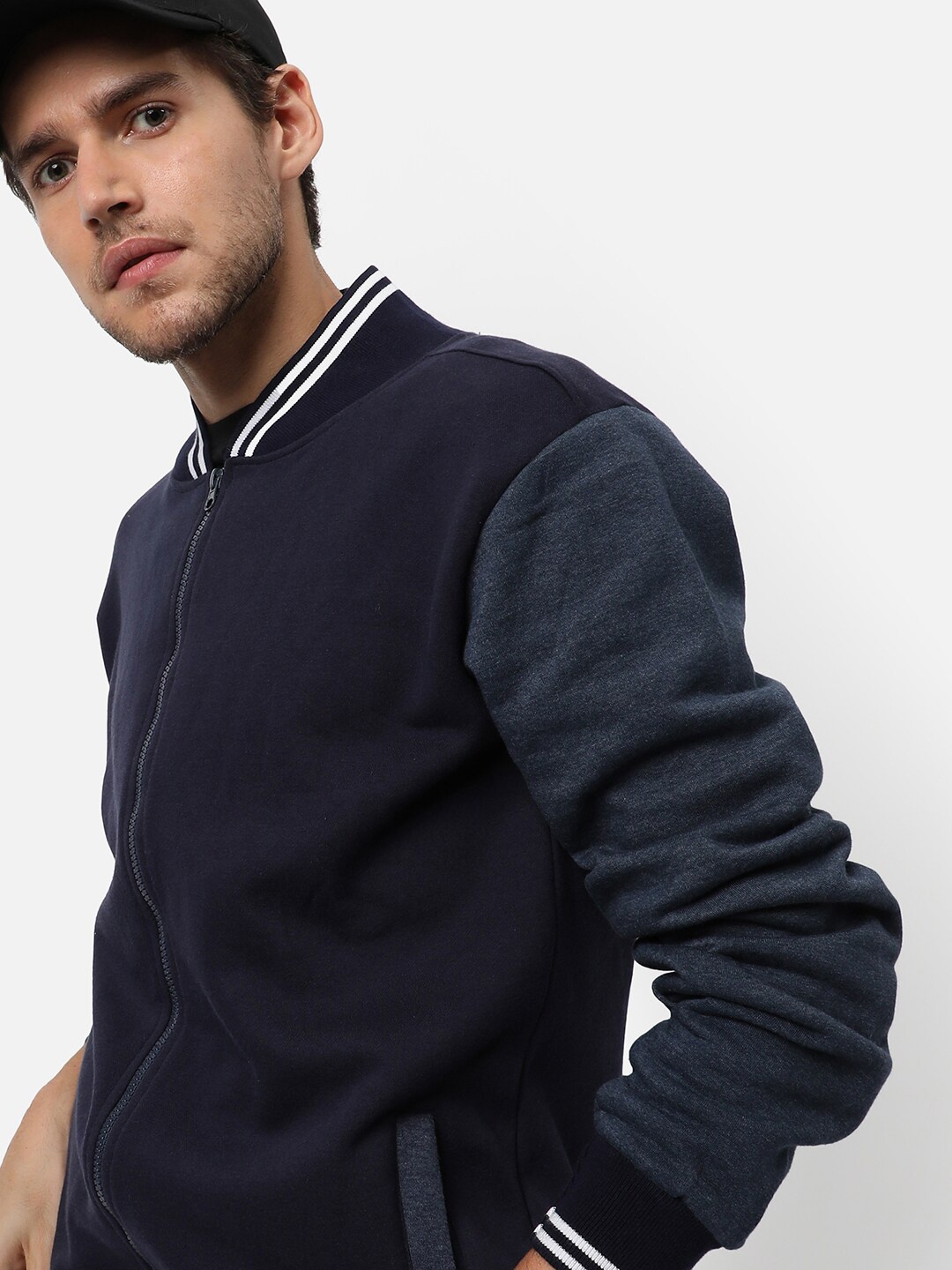 

Campus Sutra Men Blue Windcheater Longline Outdoor Sporty Jacket with Embroidered
