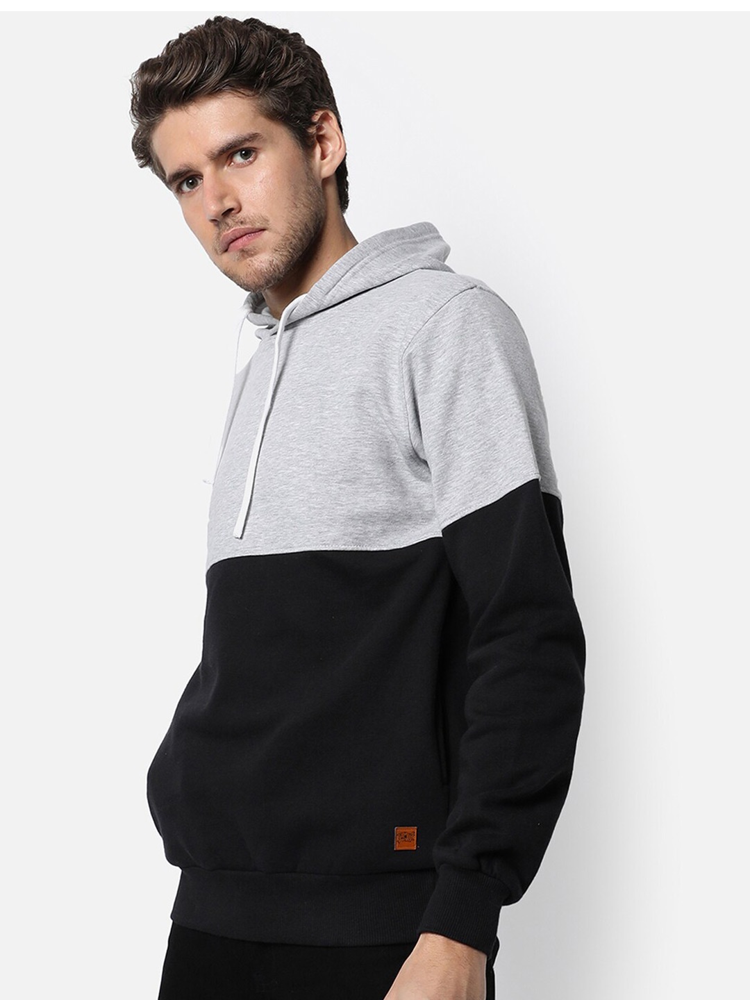 

Campus Sutra Men Black Colourblocked Hooded Sweatshirt