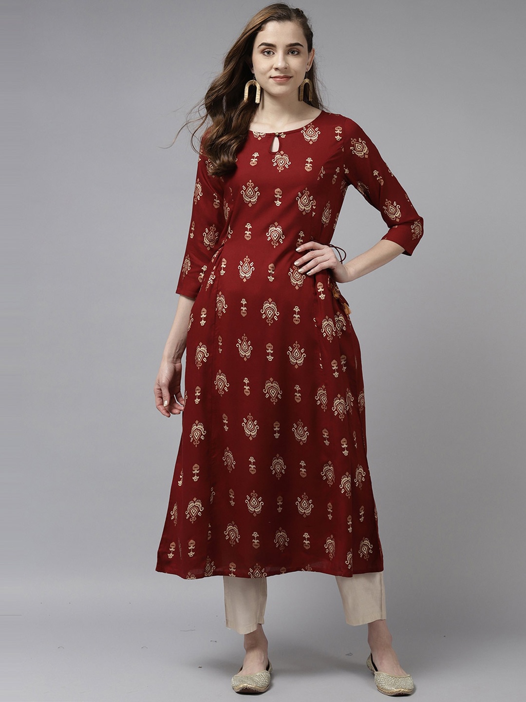 

Indo Era Women Maroon Keyhole Neck Kurta