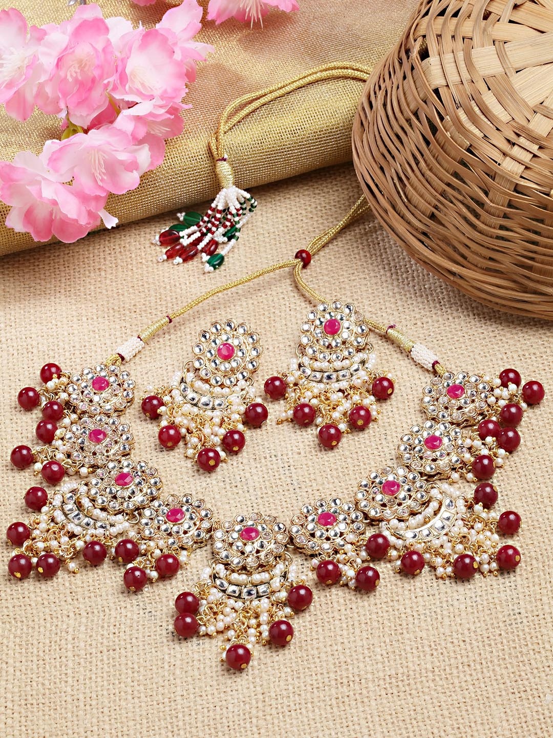 

KARATCART Gold-Plated Red & White Kundan Studded & Beaded Handcrafted Jewellery Set