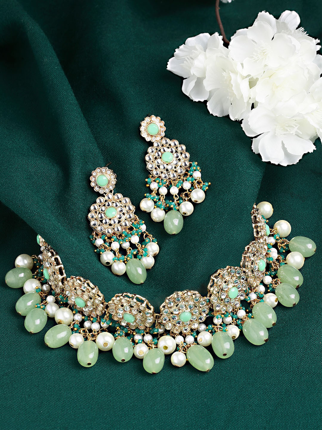 

KARATCART Gold-Plated Light Green & White Kundan Studded & Beaded Handcrafted Jewellery Set