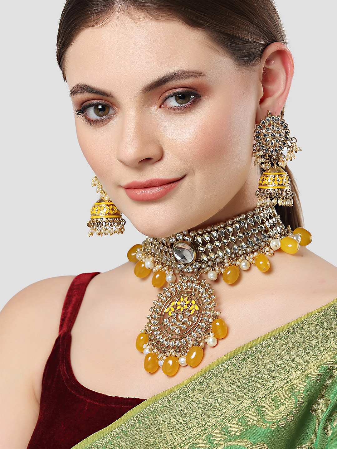 

KARATCART Gold-Plated Yellow & White Kundan Studded & Beaded Handcrafted Jewellery Set