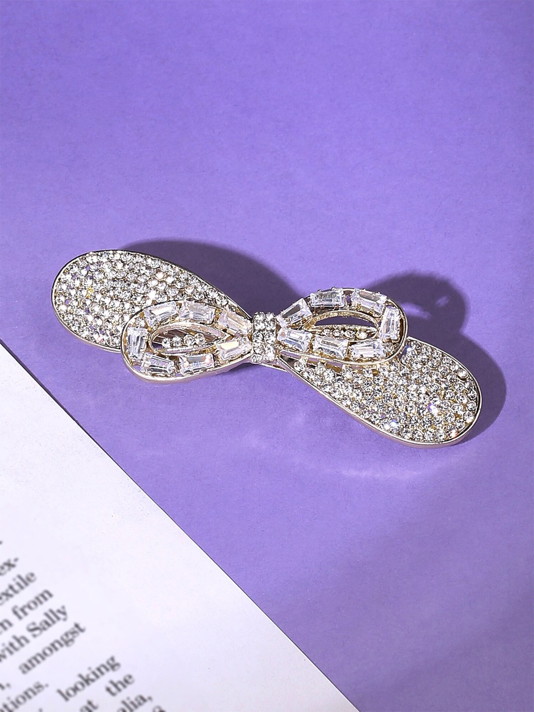 

Yellow Chimes Gold Toned Bow Designed White Crystal French Baratte Hair Clip