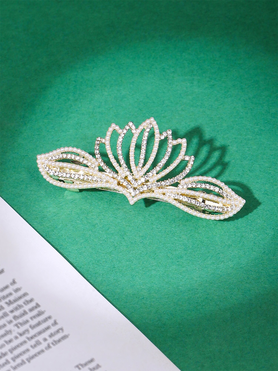 

Yellow Chimes Gold Toned Crown Designed White Crystal Studded French Baratte Hair Clip