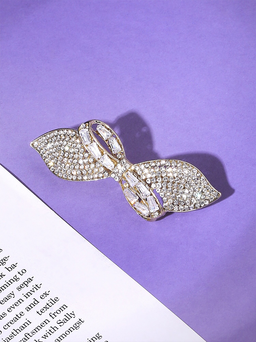 

Yellow Chimes Gold Toned Bow Designed White Crystal French Baratte Hair Clip