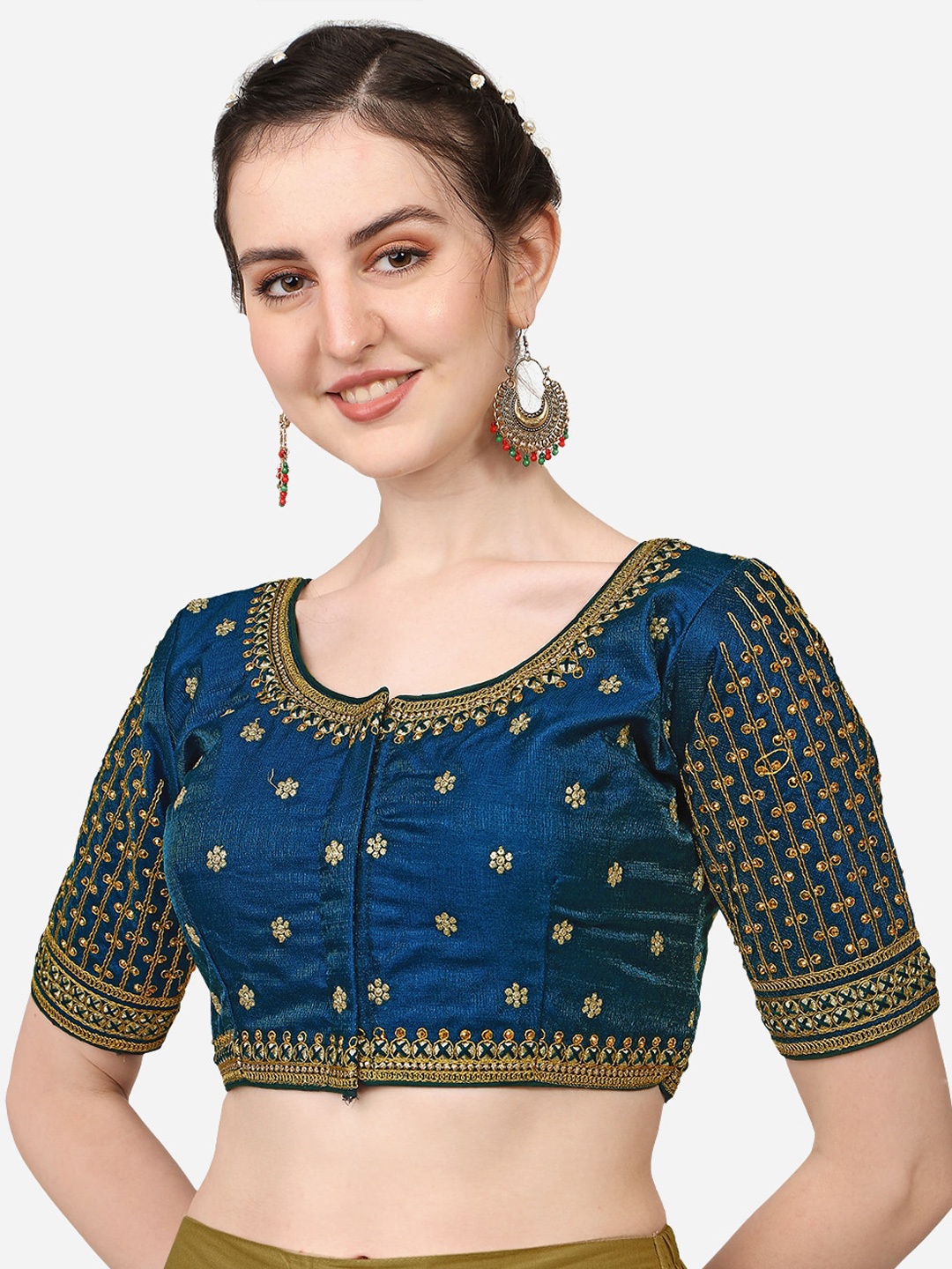 

Sumaira Tex Women Teal Blue Embroidered Silk Saree Blouse