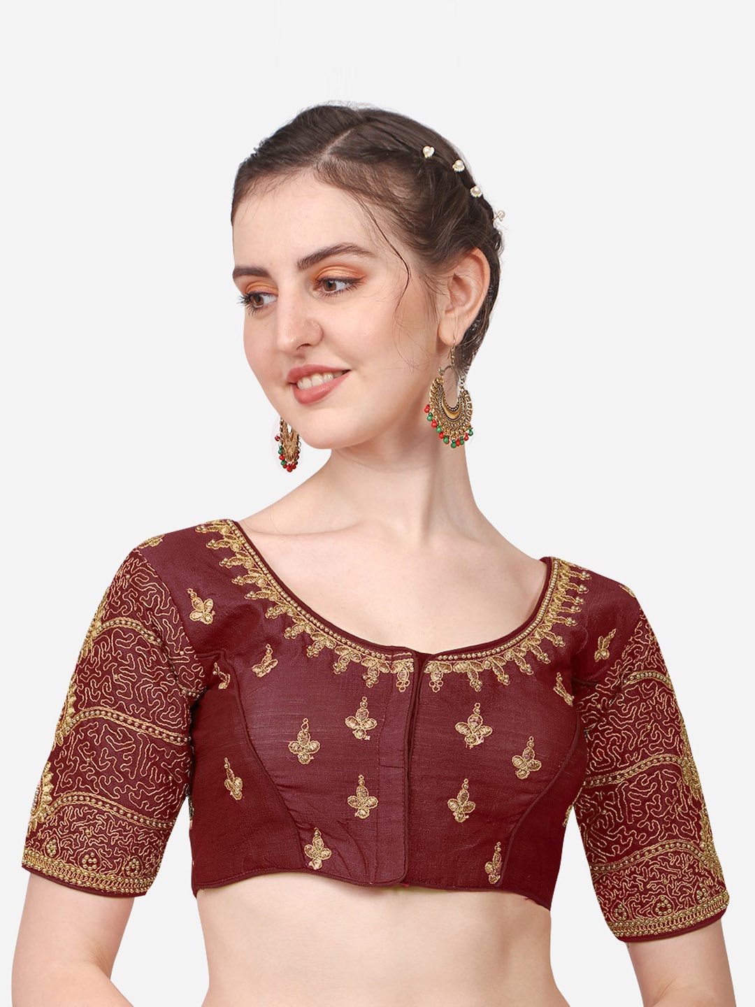 

Sumaira Tex Maroon & Gold-Toned Embroidered Saree Blouse