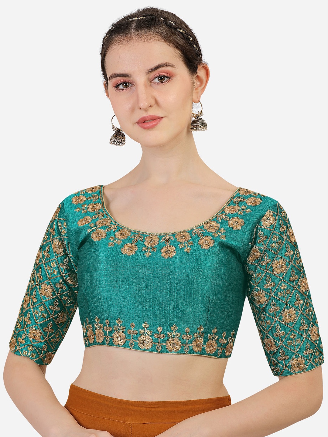 

Sumaira Tex Teal Embroidered Saree Blouse