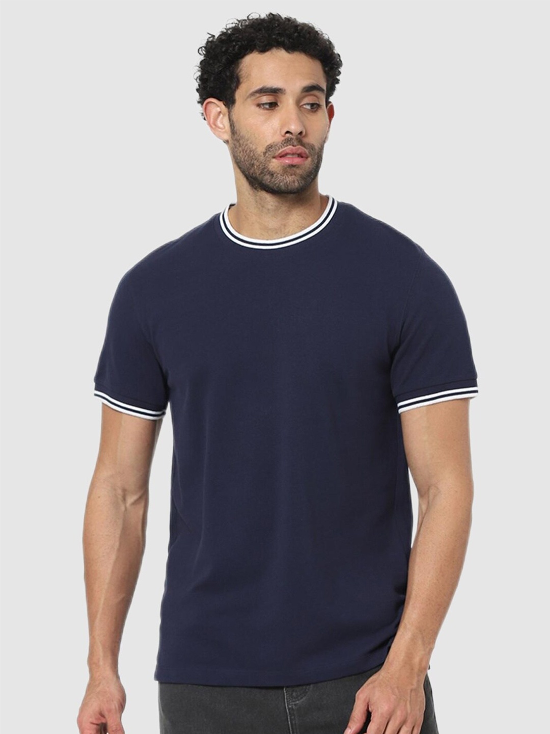 

Celio Men Navy Blue Solid T-shirt