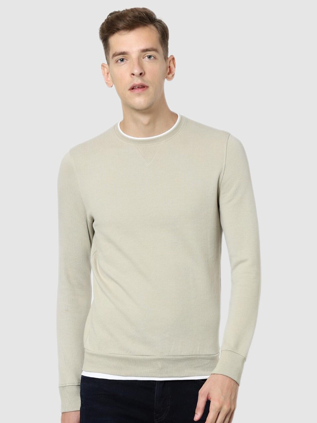 

Celio Men Beige Solid Sweatshirt