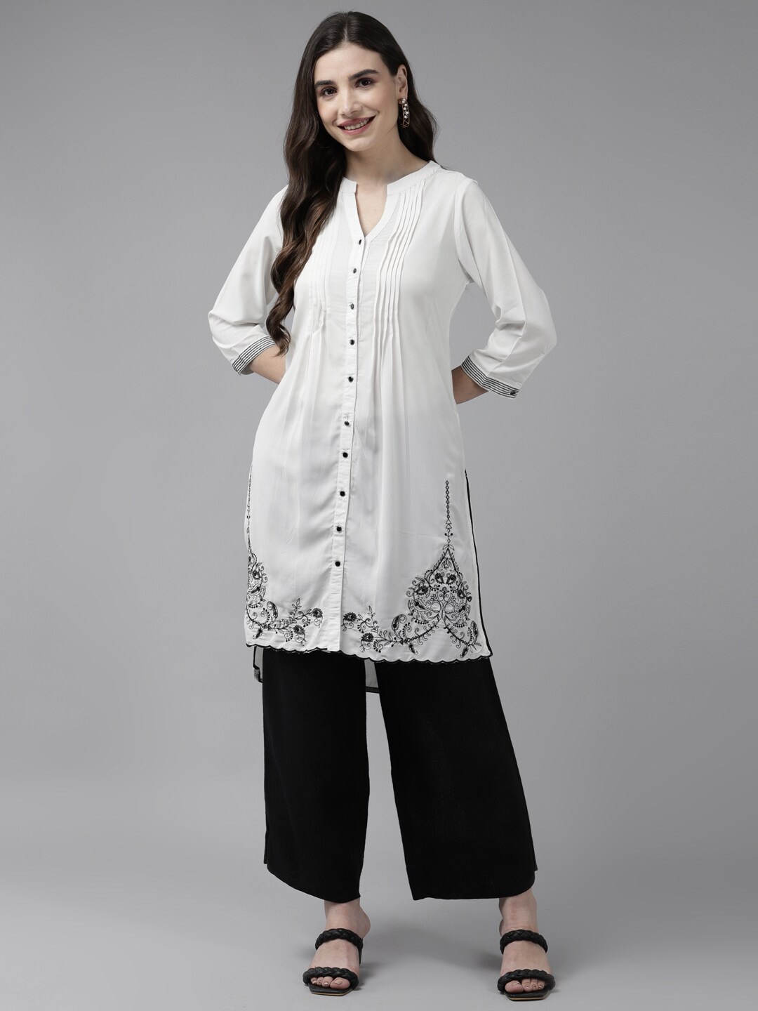 

Aarika Women White & Black Ethnic Motifs Embroidered Kurta with Palazzos
