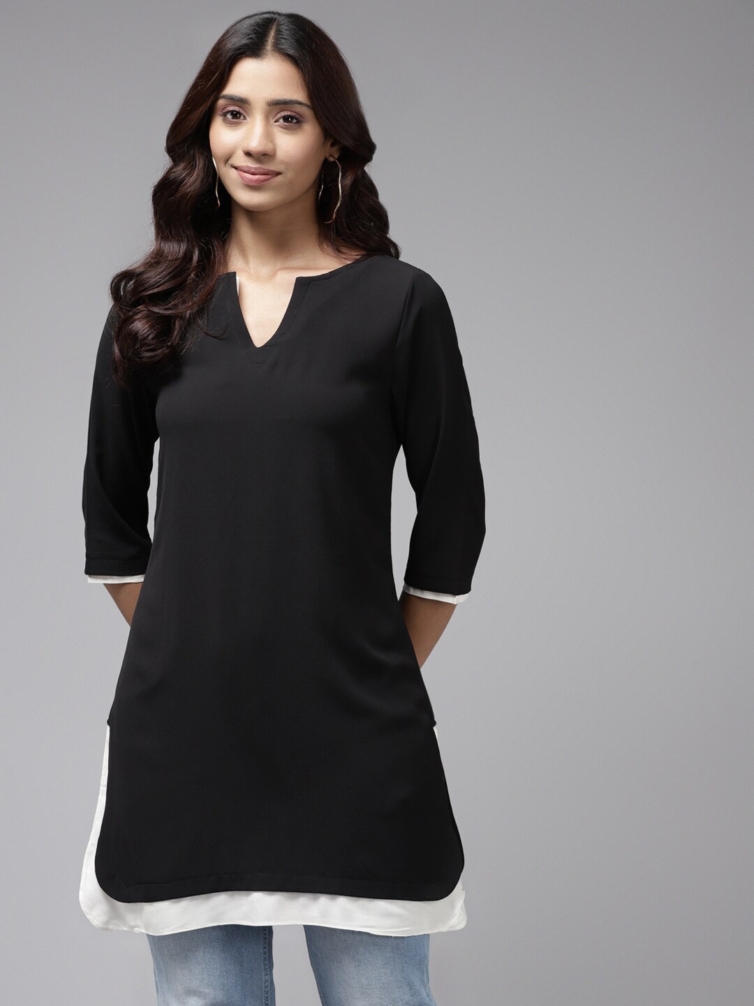 

Aarika Women Black & White V-Neck Pure Cotton Tops