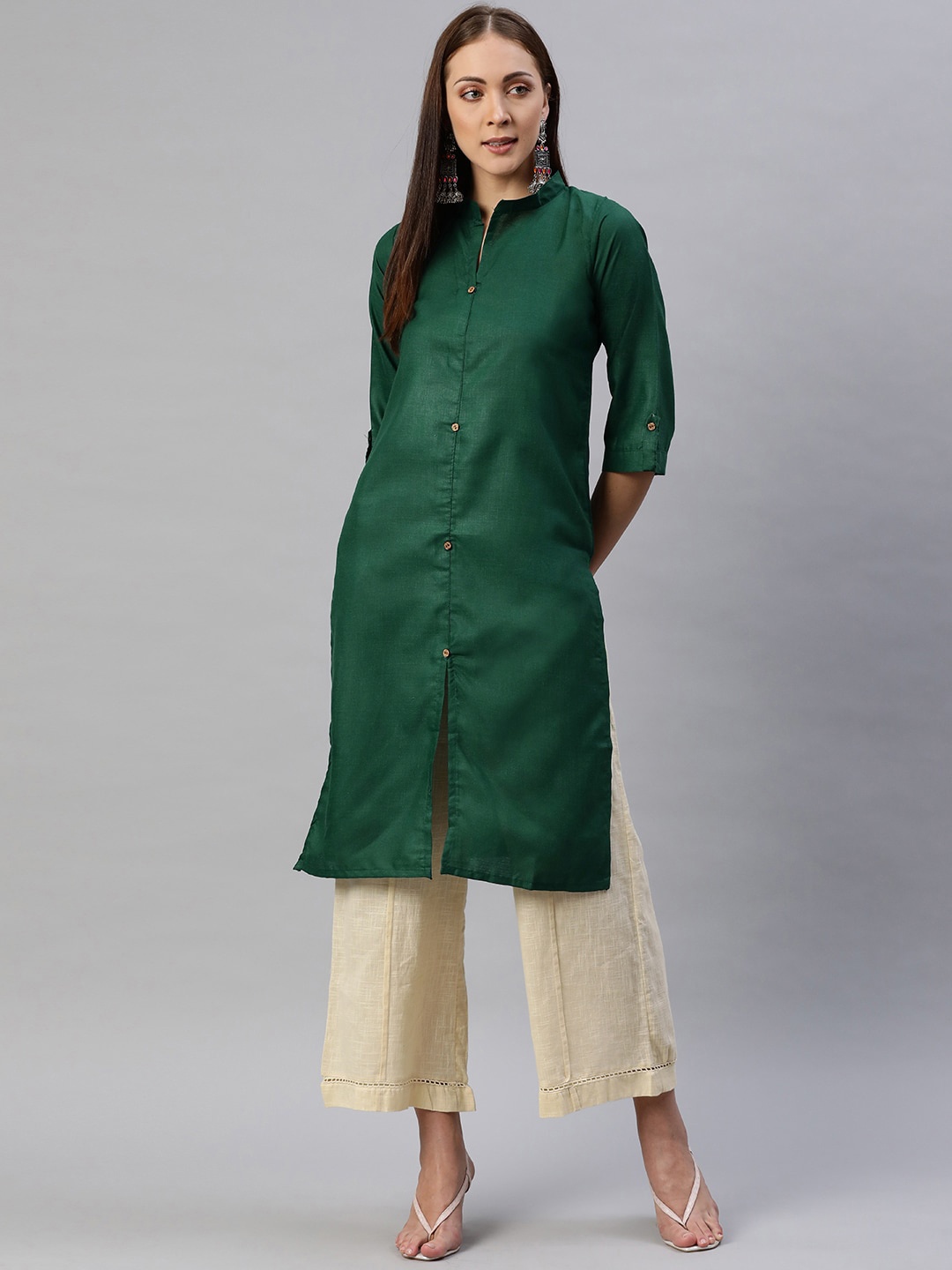 

Aarika Women Green Solid Pure Cotton Kurta