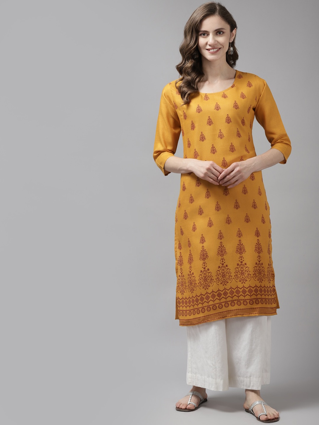 

Aarika Women Yellow Ethnic Motifs Printed Cotton Kurta