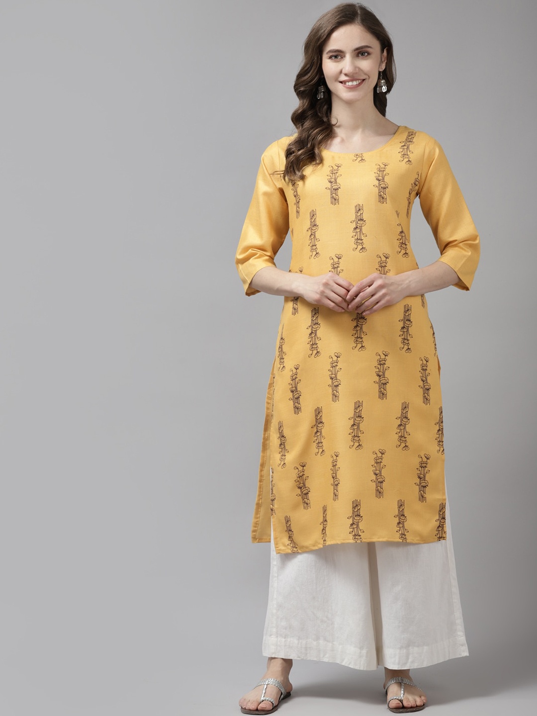 

Aarika Women Yellow Floral Printed Kurta