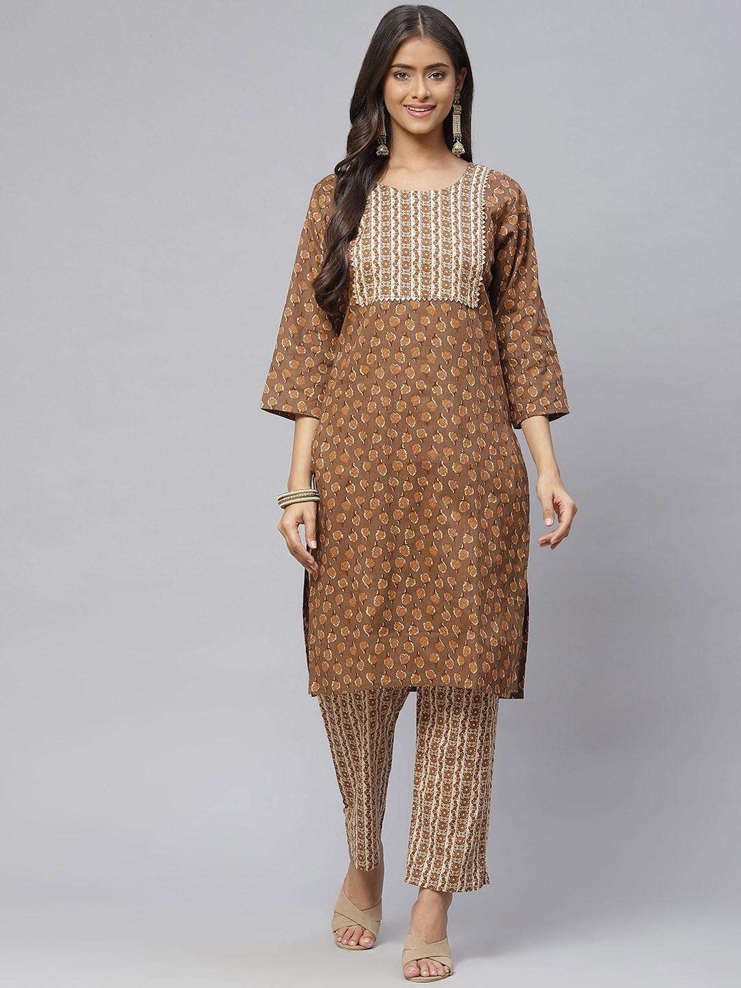 

Aarika Women Brown Ethnic Motifs Printed Pure Cotton Kurti with Trousers