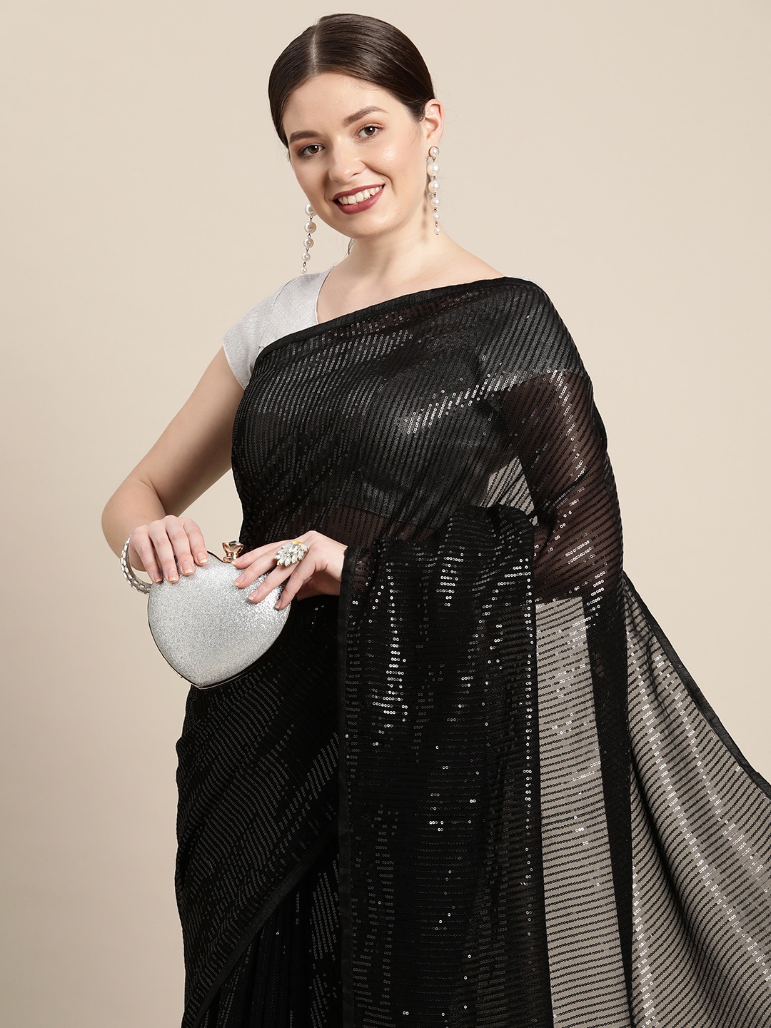 

Pothys Black Striped Sequinned Pure Chiffon Saree