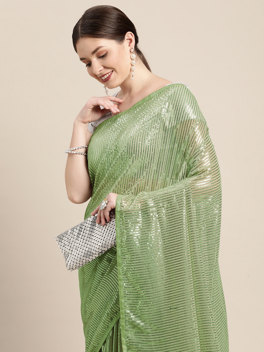 

Pothys Green Striped Sequinned Pure Chiffon Saree