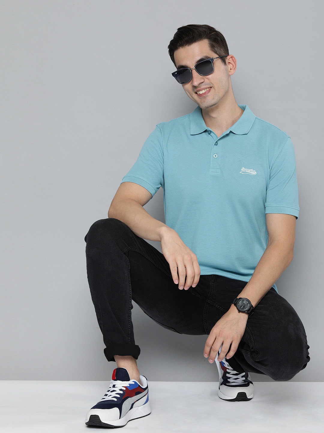 

HERE&NOW Men Blue Solid Polo Collar Pure Cotton T-shirt