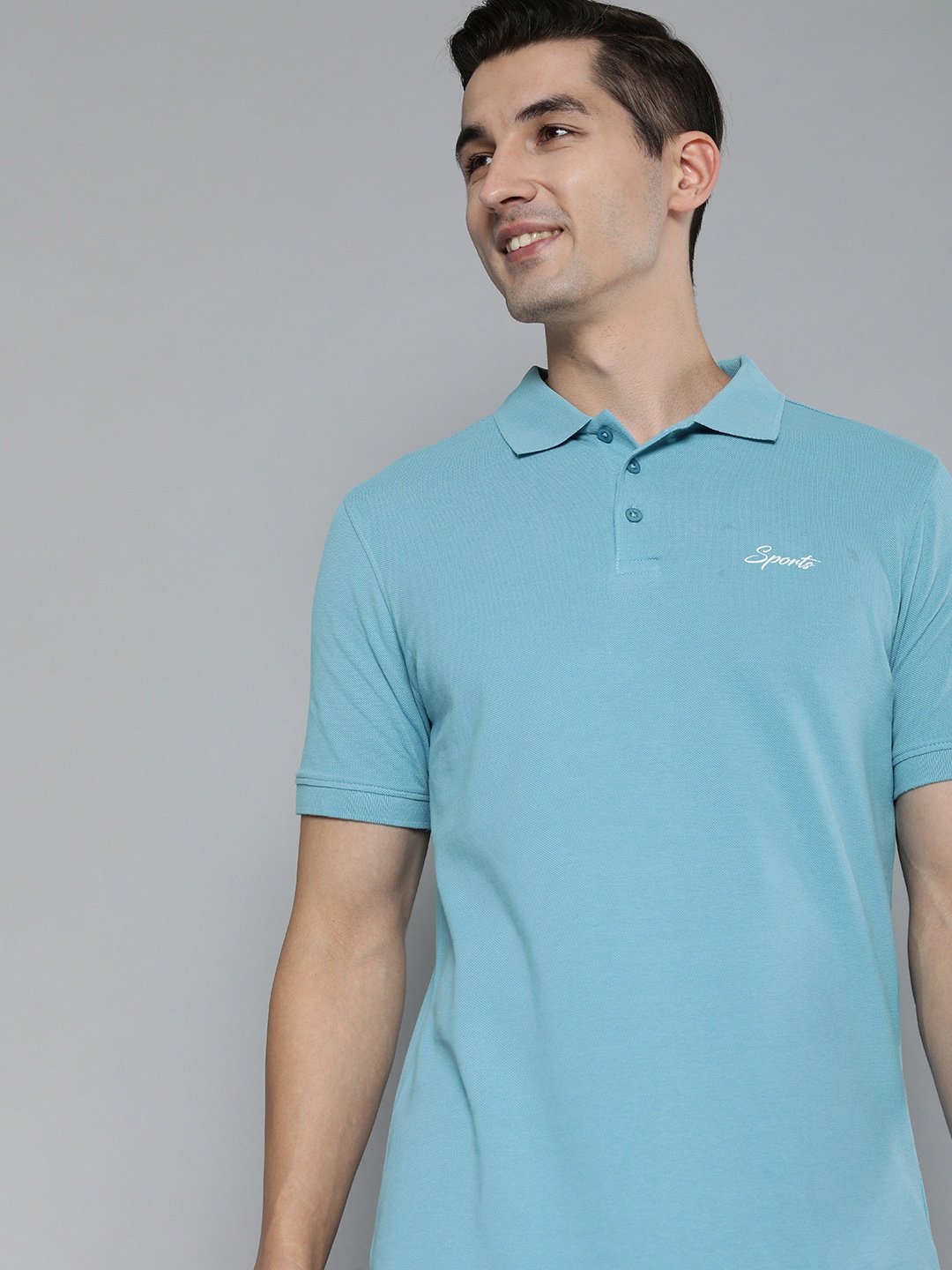 

HERE&NOW Men Blue Solid Polo Collar Pure Cotton T-shirt