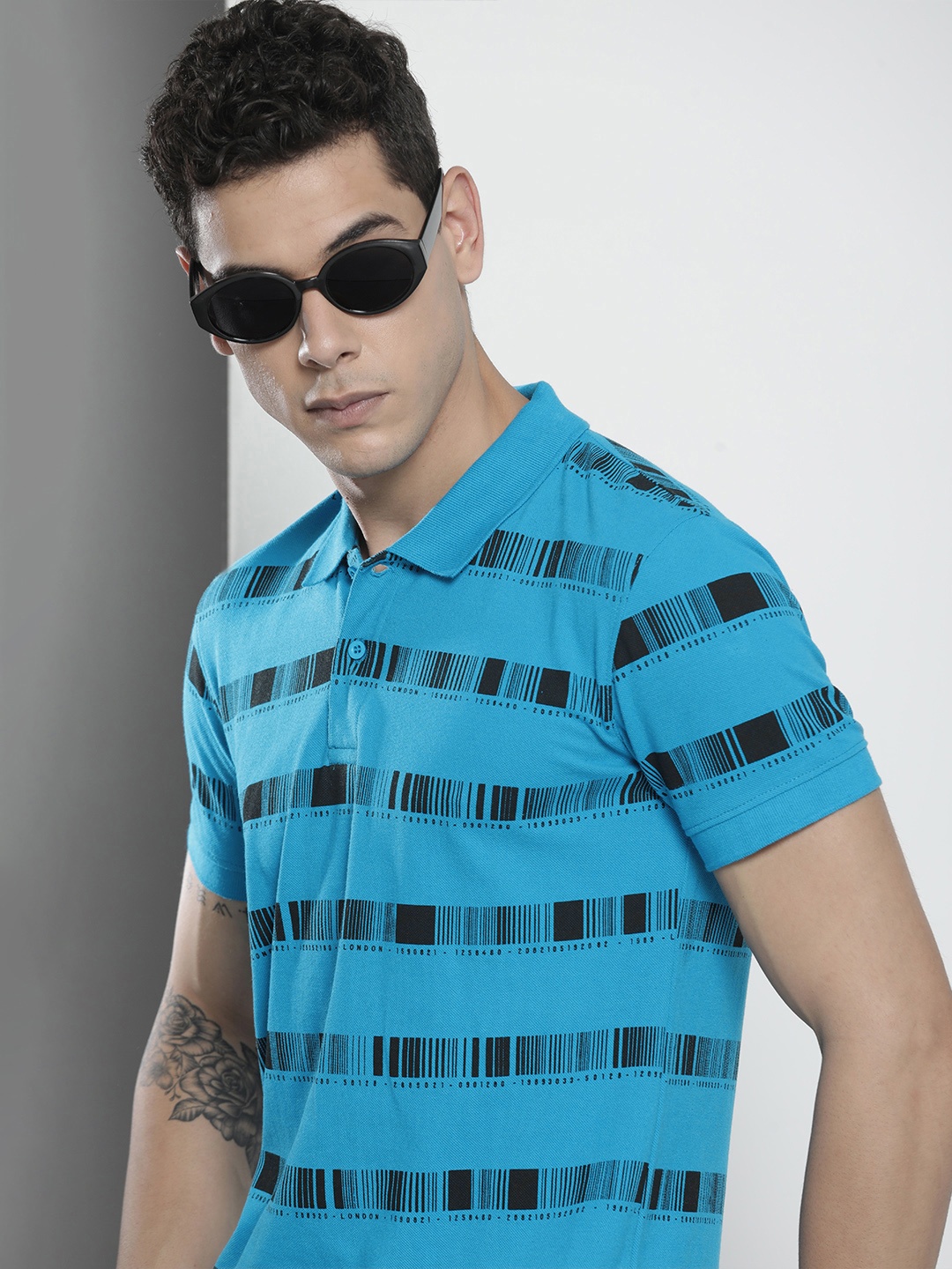 

The Indian Garage Co Men Blue Printed Polo Collar T-shirt