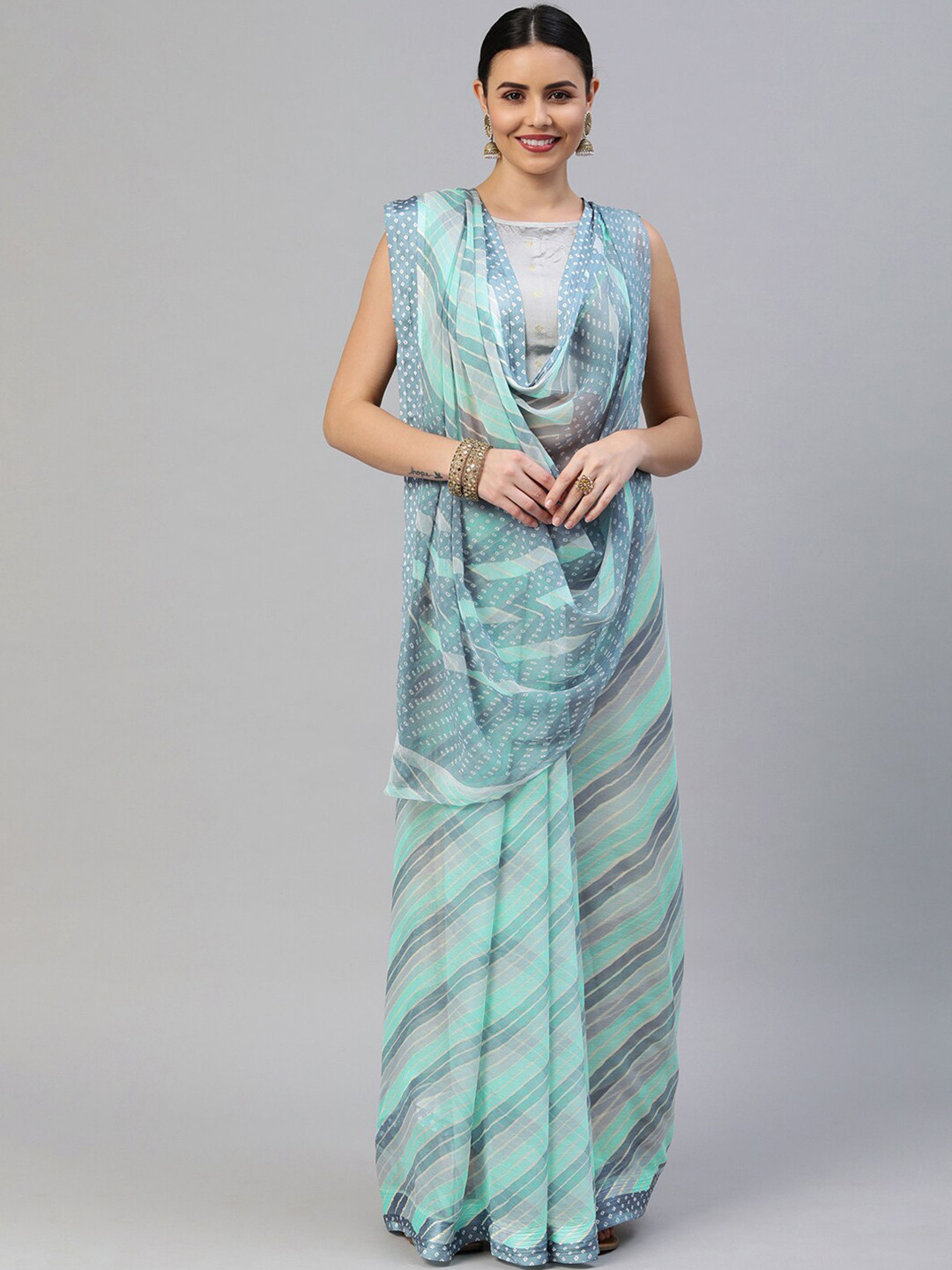 

Satrani Blue & Off White Leheriya Saree