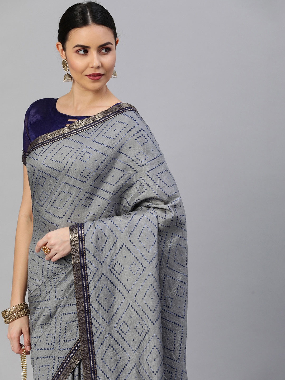 

Satrani Grey & Blue Bandhani Banarasi Saree