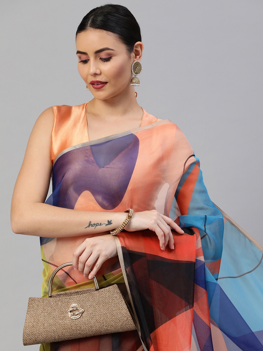 

Satrani Orange & Blue Colourblocked Organza Saree