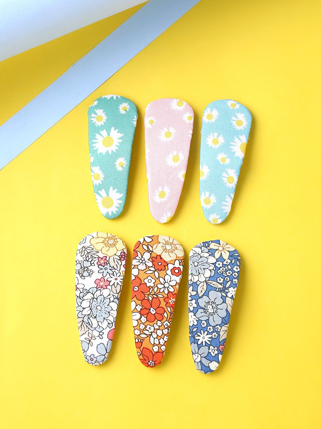

Melbees by Yellow Chimes Girls set of 6 Multicolor Printed Tic Tac Hair Clips, Blue