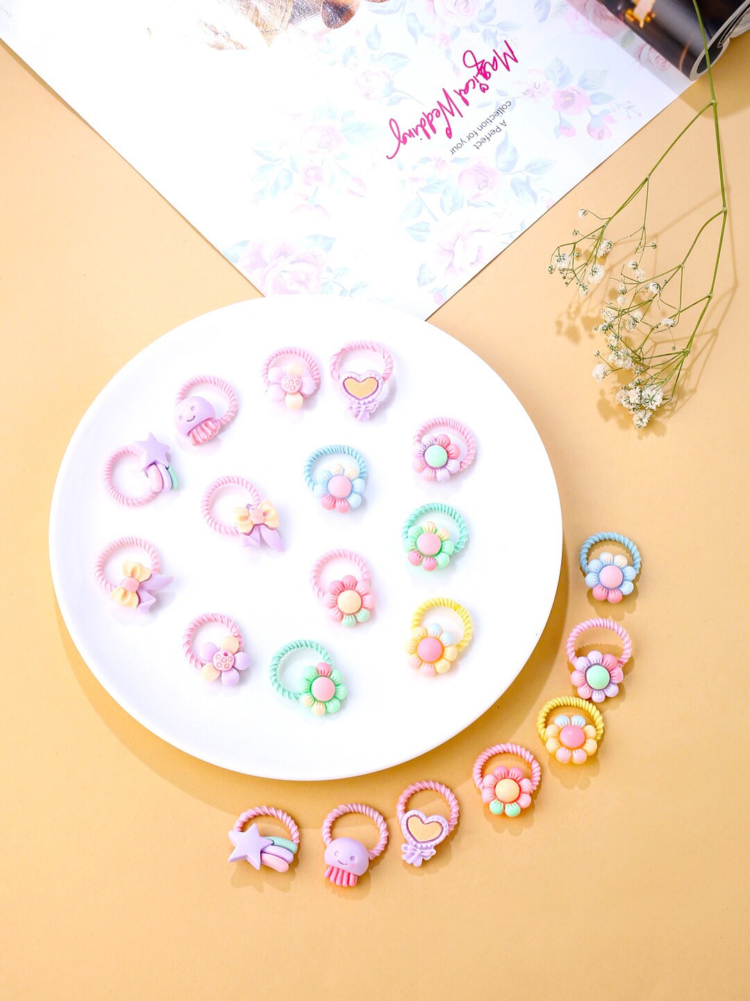 

Melbees by Yellow Chimes Girls Set of 20 Pcs Multicolor Floral Shaped Rubber Bands