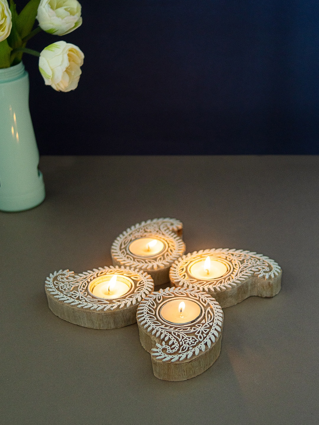 

Golden Peacock Set of 4 Brown Paisley Shaped Carved T-Light Candle Holder Blocks